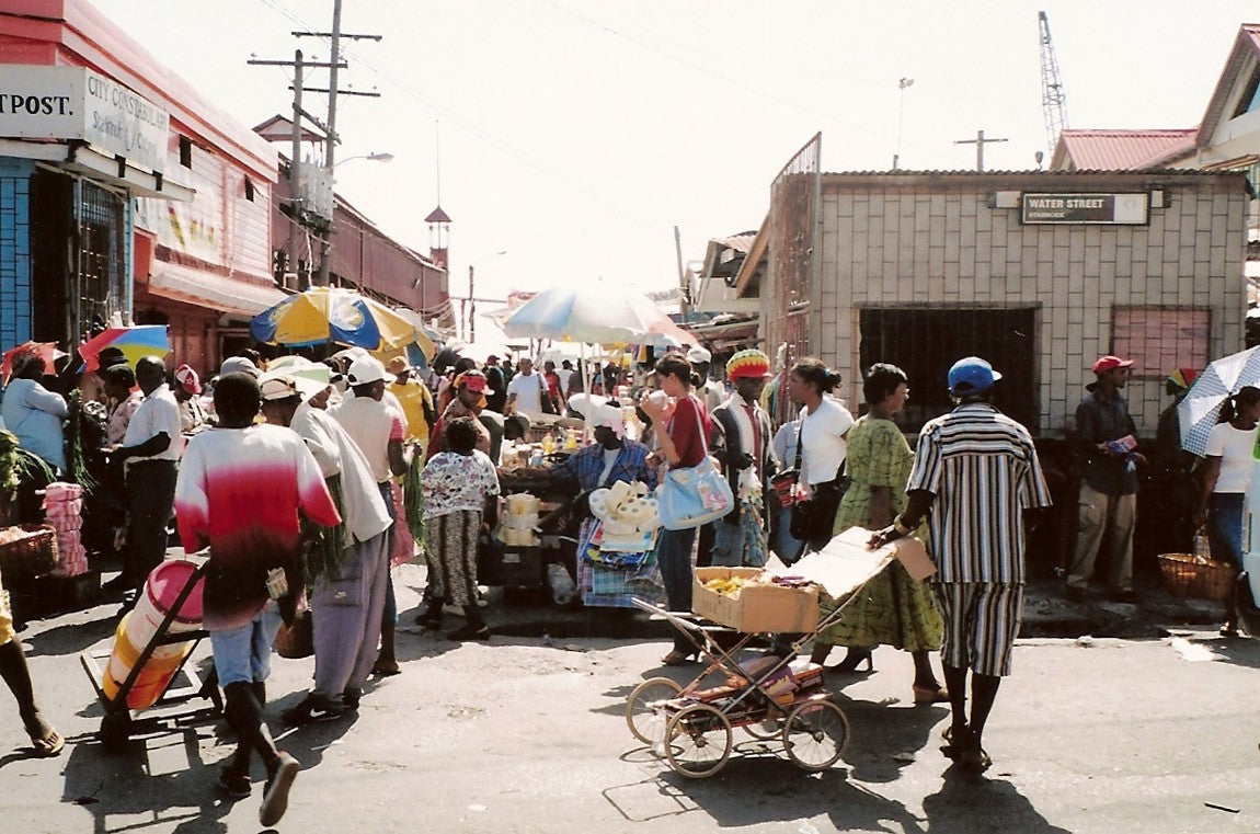 Stabroek Market area in Georgetown, Guyana, with vendors and shoppers