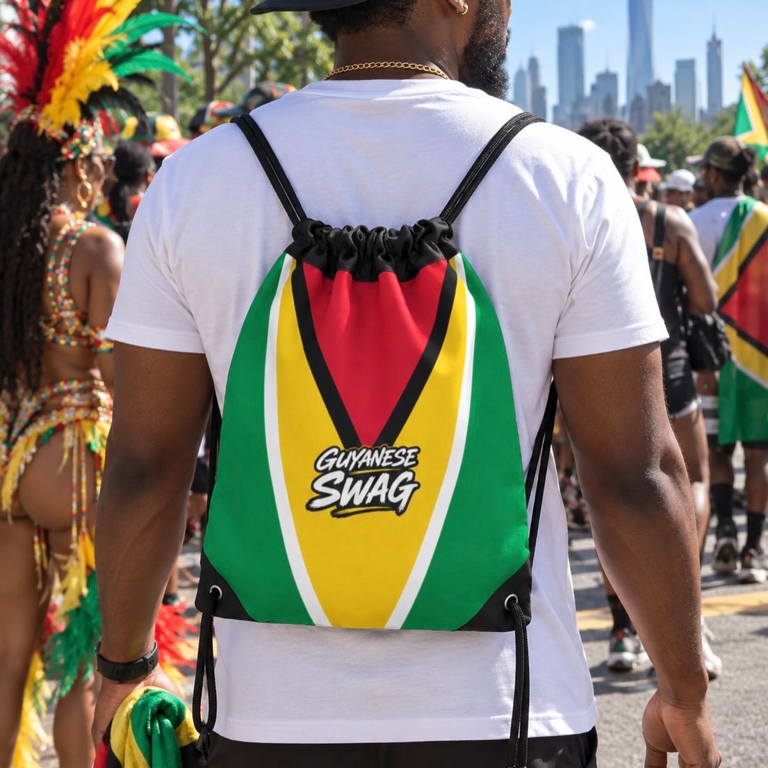 Guyanese Swag flag-themed backpack worn at a Caribbean parade with a city crowd in the background