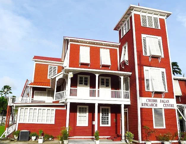 Red House in Georgetown with red timber walls and white exterior details