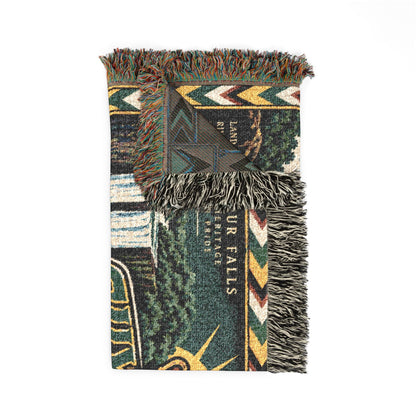 Guyana waterfall blanket with woven texture and fringe