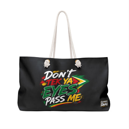 "Don't Tek Ya Eyes Pass Me" Black Weekender Bag