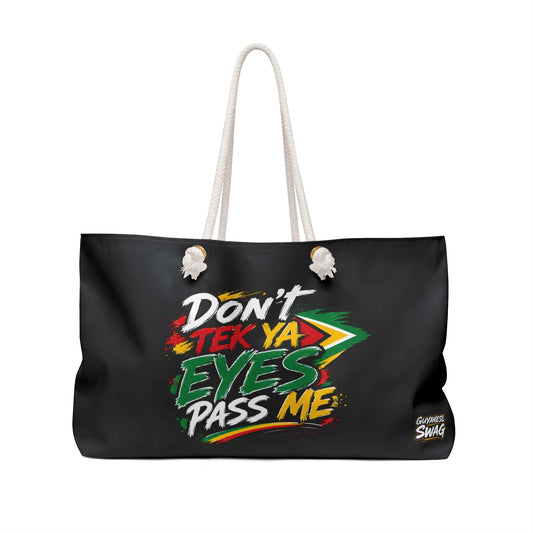 "Don't Tek Ya Eyes Pass Me" Black Weekender Bag