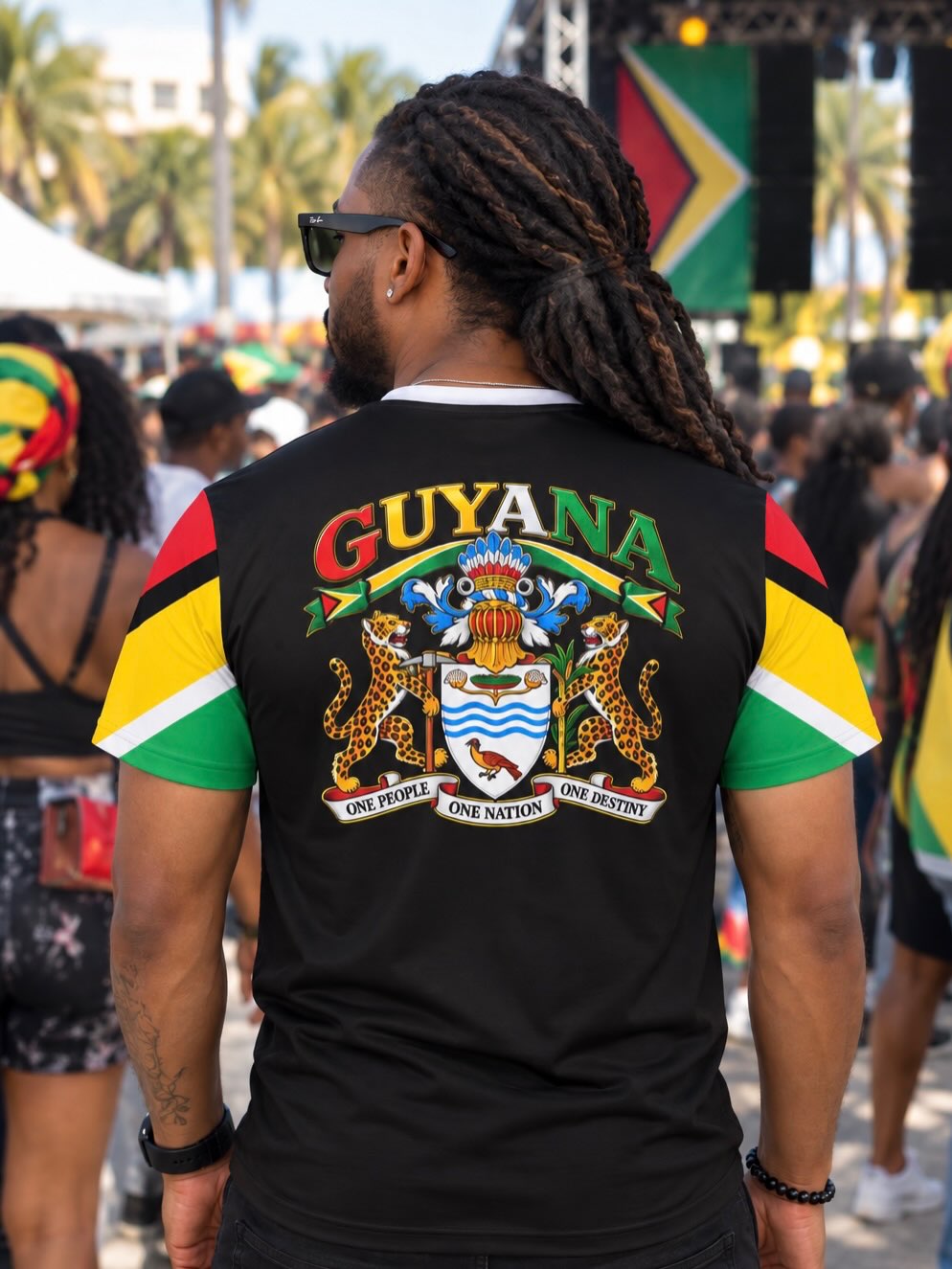 Guyanese Swag graphic shirt worn in a café.